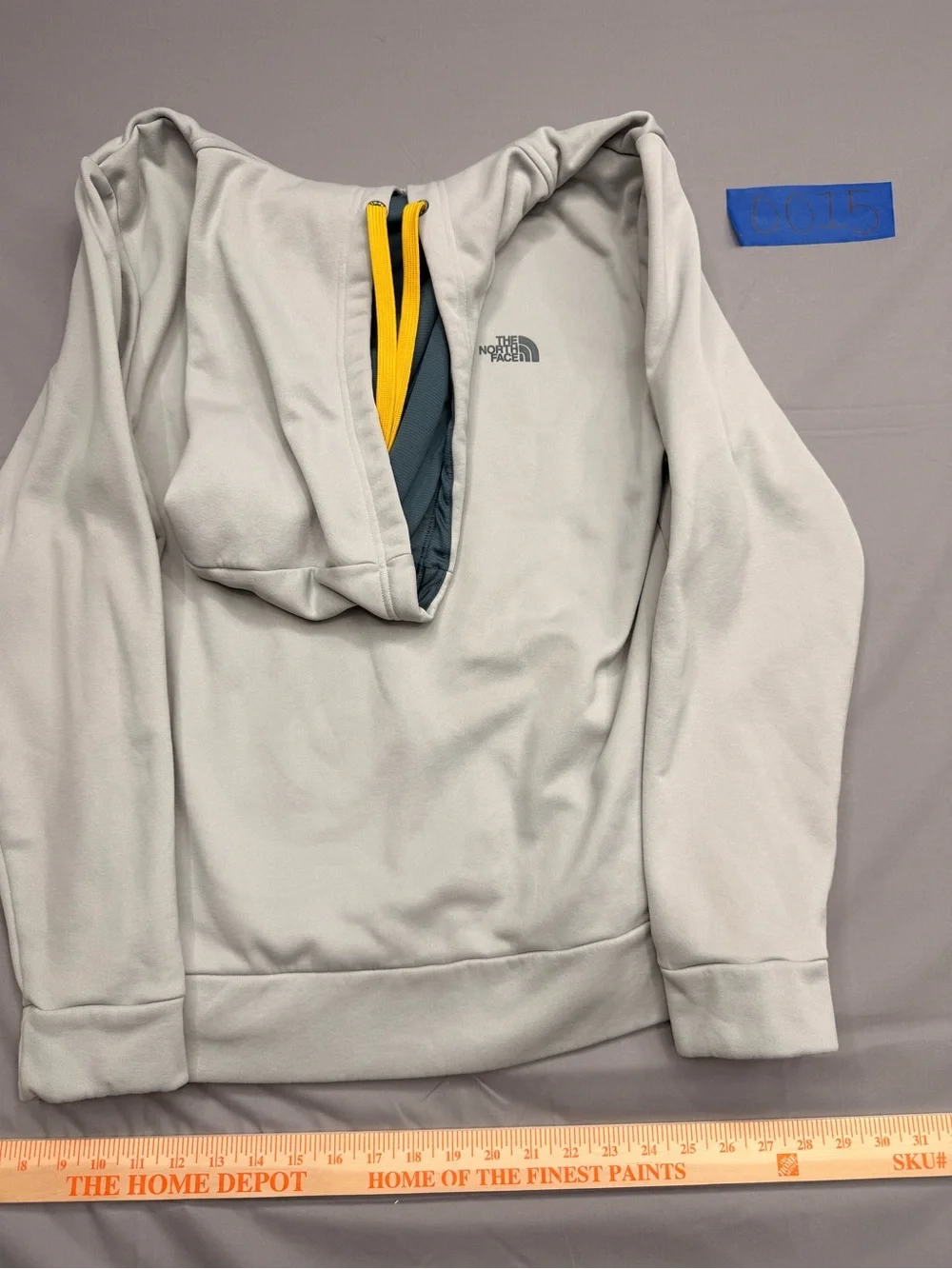 The North Face Men's Light Gray Crewneck Hoodie with Yellow Drawcords